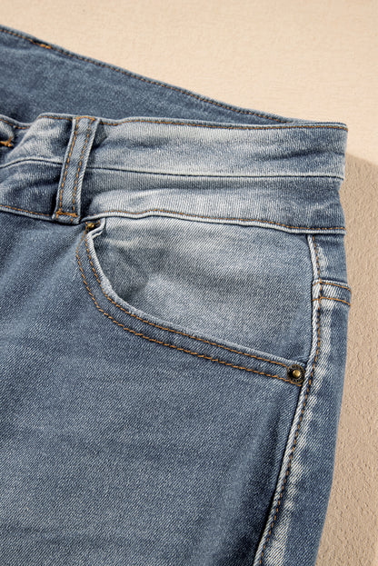 Dusk Blue Vintage Light Wash Ripped Raw Edge Flare Jeans